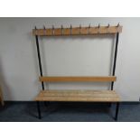 A ten hook cloakroom coat stand with bench, 160 cm high x 150 cm wide x 39.5 cm deep.