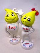 A pair of cast iron Esso figures,