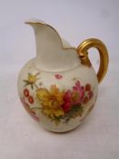 A Royal Worcester ivory hand painted gilded jug No.