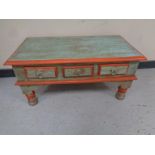 A Middle Eastern style coffee table fitted three drawers