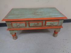 A Middle Eastern style coffee table fitted three drawers
