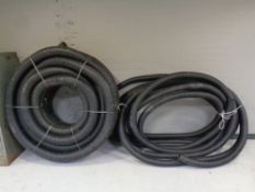 A large quantity of black plastic piping