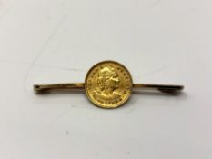 A 9ct yellow gold bar brooch set with a Peru 1/5 libra gold coin, gross 3.2g.