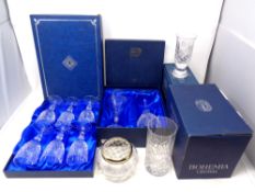 A tray containing boxed glassware to include Bohemian Crystal high ball and Irish coffee glasses,