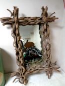 A driftwood framed mirror