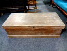 An antique pine blanket box,