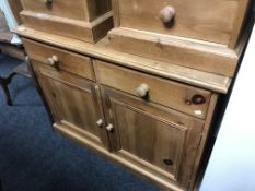 A pine farmhouse double door kitchen sideboard fitted two drawers,