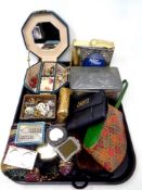 A tray containing jewellery boxes, costume jewellery, pin badges, silver plated photo frames,