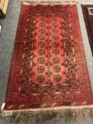 An Afghan Bokhara rug 178 cm x 104 cm