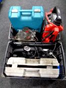 Two crates containing tools to include trolley jack, circular hand saw, jump starter,