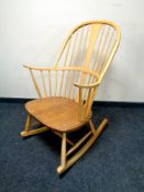 An Ercol elm rocking chair,