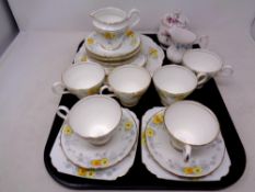 A tray containing a 21 piece bone china tea service together with a further Royal Albert bone china