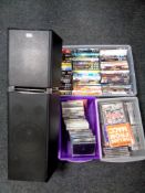 Three boxes containing assorted DVDs and CDs together with a Panasonic SC-UA7 base speaker