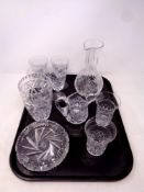 A tray containing assorted lead crystal glassware to include wine carafe and glasses, ashtray,