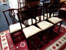 A set of six 19th century mahogany dining chairs together with one further similar dining chair