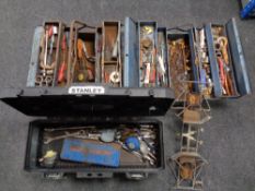 A Stanley toolbox together with two further metal concertina toolboxes containing assorted hand