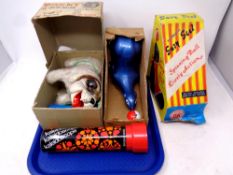 A tray containing mid 20th century toys to include Donny The Smiling Bulldog, boxed,
