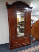 A Victorian mahogany mirrored door wardrobe