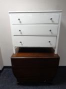 An Edwardian mahogany drop leaf table together with a painted three drawer chest