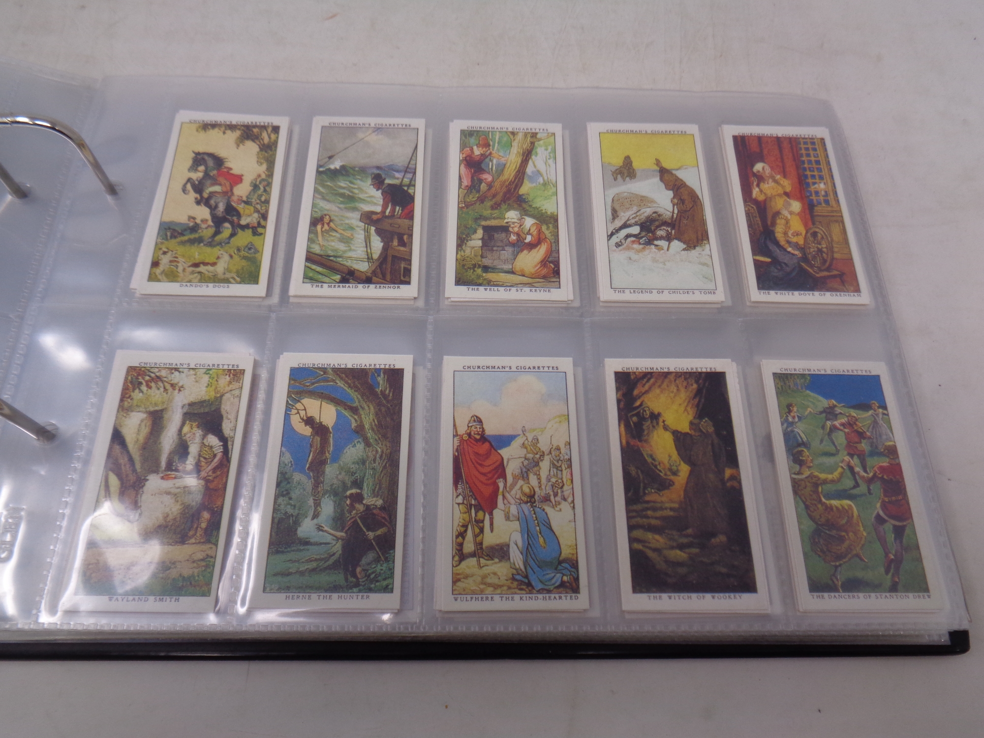 An album containing Wills, Churchman and Mitchell cigarette cards, navy, dogs, - Image 3 of 4