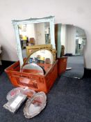 A box containing assorted framed mirrors, picture frames,