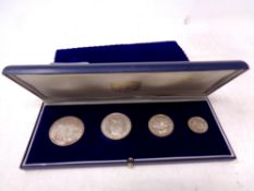 A Franklin Mint Commonwealth of the Bahamas four piece proof coin set in case