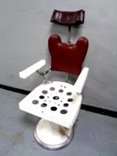 A 20th century gas lift barber's chair