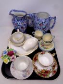 A tray containing assorted ceramics to include Royal Albert Country Roses trio,