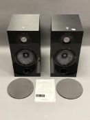 A pair of Focal Chora 806 speakers, each with stand.