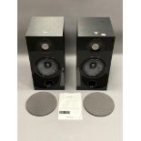 A pair of Focal Chora 806 speakers, each with stand.