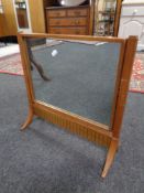 A dressing table mirror with brass inlay,