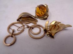 Two pairs of gold plated earrings and brooch