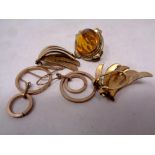 Two pairs of gold plated earrings and brooch