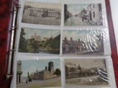 An album containing antiquarian and later postcards to include Corbridge, Morpeth,