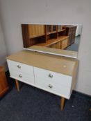 A 20th century Austin suite two tone four drawer dressing table