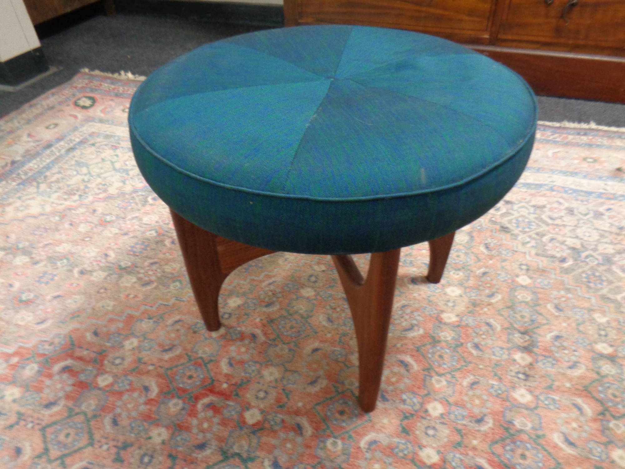 A mid 20th century teak G Plan circular dressing table stool