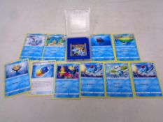 Nintendo Pokemon blue version cartridge game and Pokemon blue cards including trainer card.