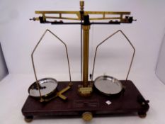 A set of early 20th century chemist's scales on a Bakelite base by Griffin and Tatlock