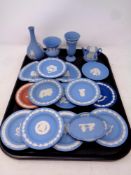 A tray containing 18 pieces of Wedgwood Jasperware to include vases, miniature teapot,