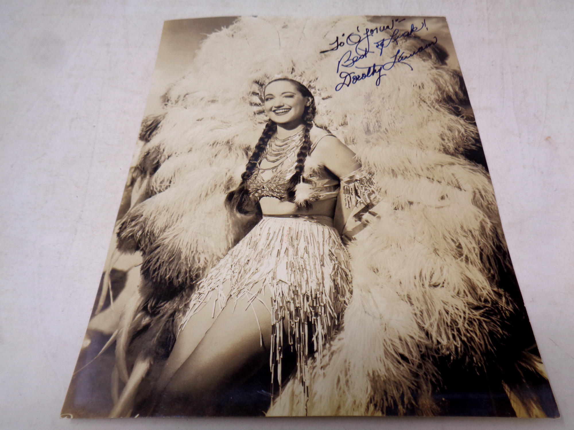 Dorothy Lamour signed vintage photograph with press stamp, and dated 1960.