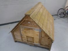 A wooden duck house