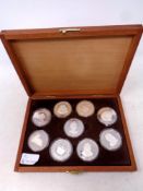 A set of nine silver commemorative coins, Queens of the British Isles,