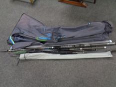 A Shimano fishing rod bag containing assorted part carp fishing rods