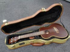 A Brunswick electro acoustic ukulele in Stagg case