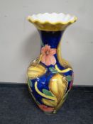 A hand painted pottery floor standing vase,