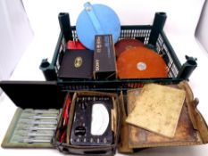 A crate containing vintage tape measures, precision tools, Sony watchman pocket TV (cased),