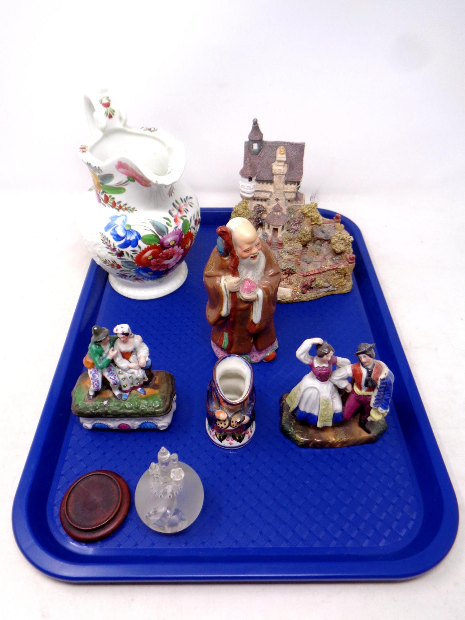 A tray containing antique and later ceramics to include continental figures,