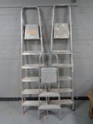 Three sets of aluminium folding steps