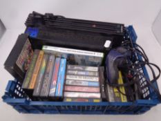 A crate containing Play Station II with controller together with a quantity of Spectrum games