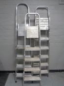 Three sets of aluminium folding steps